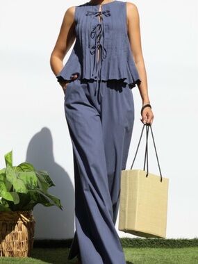Sleeveless Slate Wide-Leg Jumpsuit with Lace-Up Front